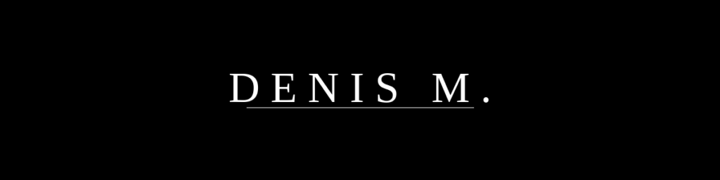 DENIS M.